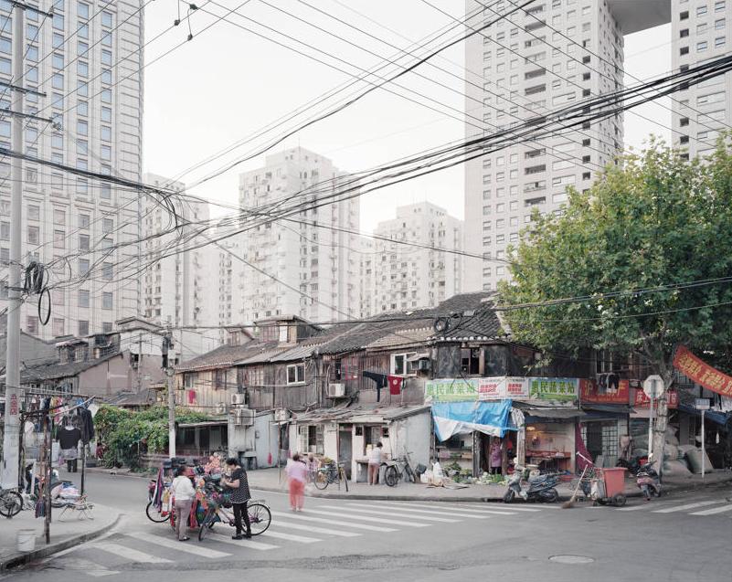 17.Shanghai City is the backdrop for a series of pictures about living places and the way we deal with public space. Photographer Arjen Schmitz said: 'I work as a fine art artist with a 8x10 inch Sinar. Working with this camera forces me to select my pictures and subject very carefully in terms of cropping, light condition, an other circumstances wich could influence my picture.' (Arjen Schmitz/Sony World Photography Awards)