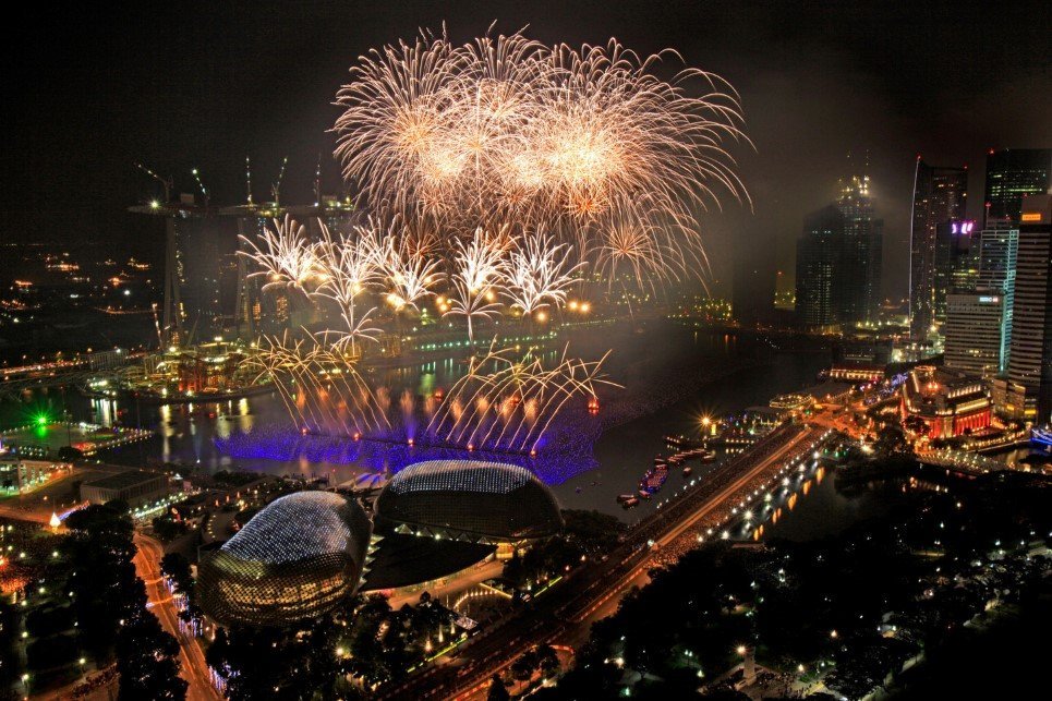 Fireworks light up the skyline of the financial district to usher in the New Year on Jan. 1, 2010 in Singapore.(AP Photo/Wong Maye-E)