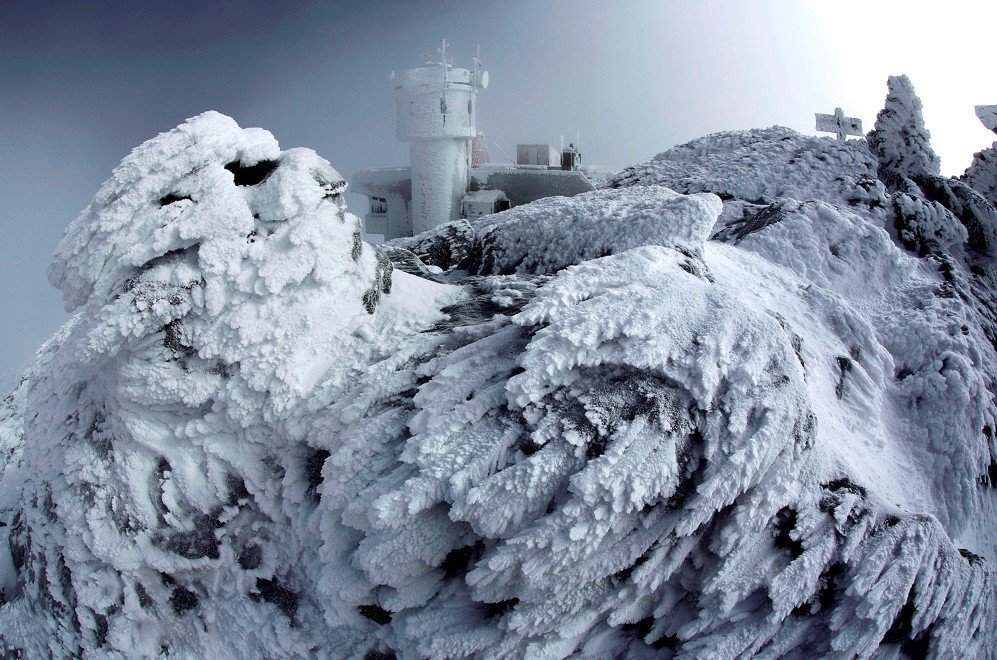 Frost covers rocks on the summit of Mount Washington in New Hampshire –March. 10, 2015. This phenomenon occurs when freezing fog hits stationary objects in frigid conditions.